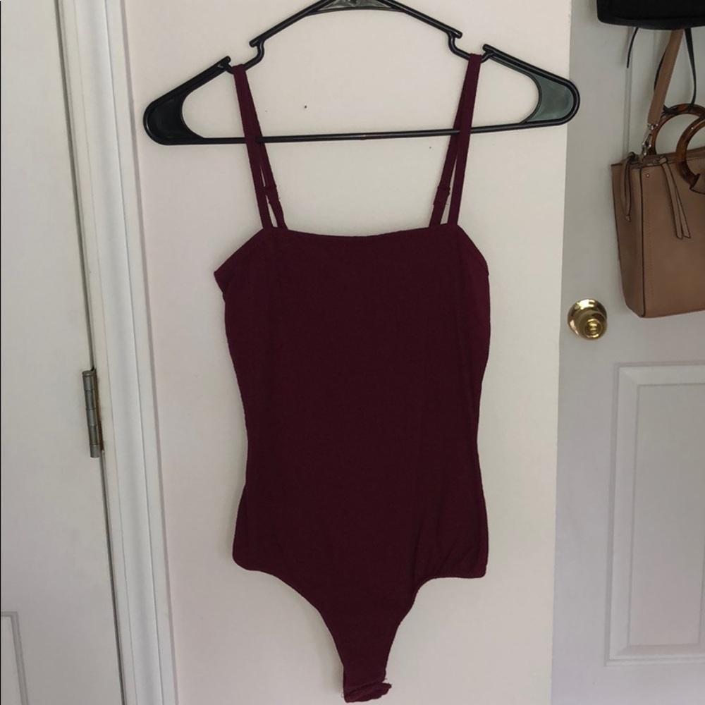 Maroon bodysuit!